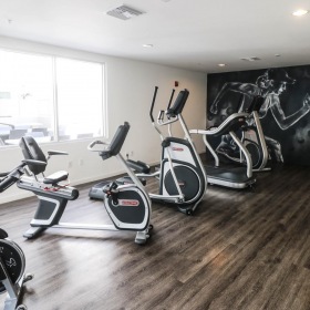 Cutting-edge amenities at your fingertips a room with exercise equipment