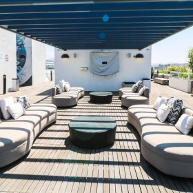 Access to resident-only features a patio with couches and tables