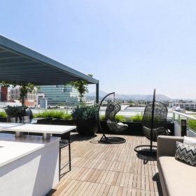 Take advantage of all Legendary Glendale has to offer a deck with couches and chairs